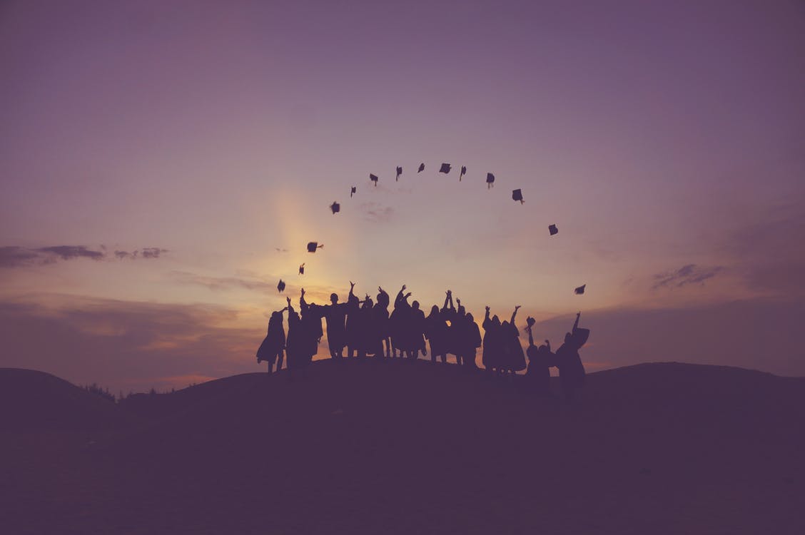 graduates, graduation, hat toss, peek counseling, katie bisbee-peek